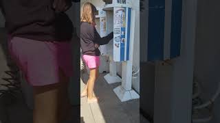 My daughter seeing an old school payphone for the first time.