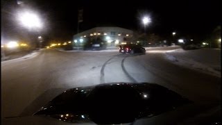 Subaru WRX and Evo 9 playing on icy roads