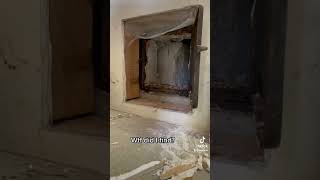 What did I find in the partially cut drywall? Removing the insulation, I found a door. Part 2 soon