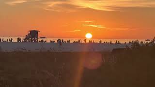 Siesta Key beach Florida   Amazing sunset ! Hordes of peeps