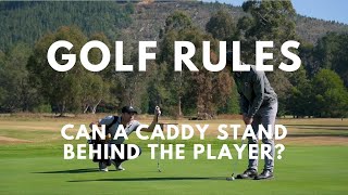 Golf Rules: Caddy Standing Behind the Player