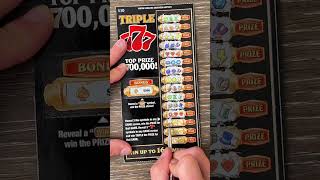 Trying my luck on 2 $10 Triple 7's Lottery Tickets!