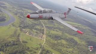 L-29 Delfin in formation with Cessna 210