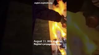 Protesters set fire to poster of Iranian regime leaders in Mashhad | Iran protests