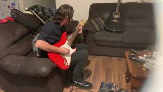 My mate Leigh playing Metallica on my Squire Fender Strat