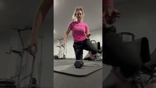 Single arm neutral grip shoulder press kneeling