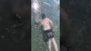 Guy Dives In Frozen Lake And Struggles To Come Back Up