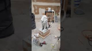 painting a lion (outdoor ornaments)