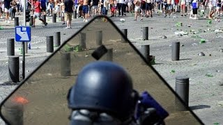 Russian Hooligans attacking England Supporters who try to flee before the match Russia - England