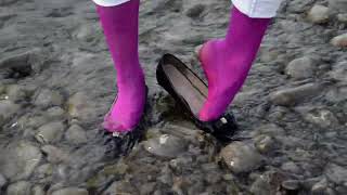 Wetlook - Ambra in river with flat shoes and pink pantyhose