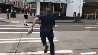 Alex Jones Chases a Guy Across the Street