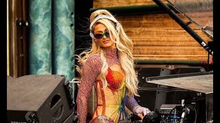 Paris Hilton puts on a leggy display in bodysuit with ruffled mini skirt as she DJs at Tomorrowland