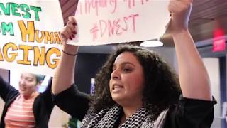 Divestment Protestors Interrupt Harvard University President Talk