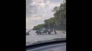 Officials Of Nigerian Police Seen Pushing Their Broken Down Operational Vehicle