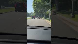 driving Tesla Model Y through Beverly Hills CA