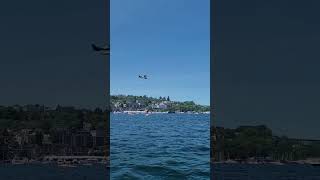 Seaplane taking off from Lake Union and a Police Boat