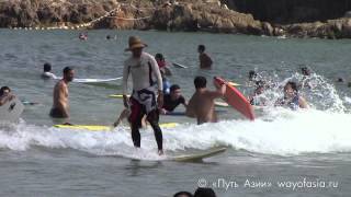 Серфинг на пляже Big Wave Bay в Гонконге