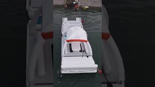 Inflatable floating dock with tent