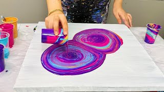 The magic of fluid art: creating a galaxy painting by pouring abstract colors!