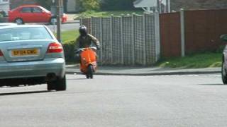 trojanlloyd on his vespa