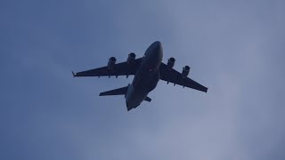 C-17 flying low on its way to Martin State Airport