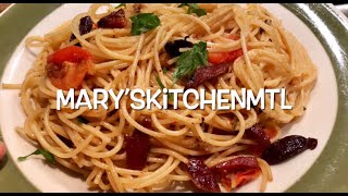 Spaghetti with Prosciutto, Kalamata olives, cherry tomatoes and cheese