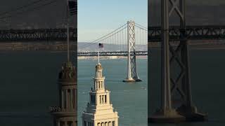 United States flag waving fiercely in San Francisco 🇺🇸 atop the Ferry Building