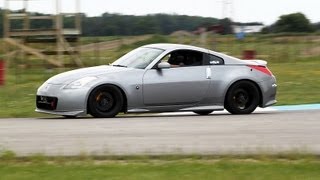 A Fair Fight. Subaru STI vs Nissan 350Z on track.