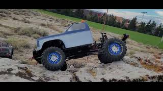 Axial scx10 ii Chevy recovery truck doing work.