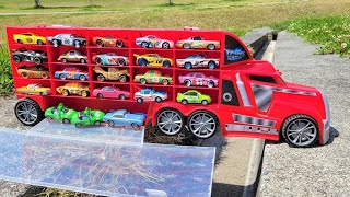 Large trucks discovering many Cars miniature cars while driving