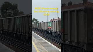 59202 passes East Worthing working 6O68 Westbury tarmac - crawly new yard.