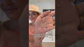 Dr. Nicole Martin from RHOM is glowing in her summer jewelry—two stunning initial necklaces!