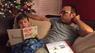 Elijah reading with Papi