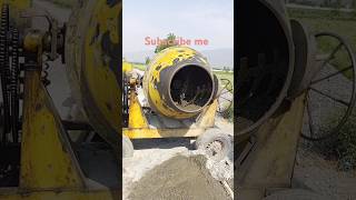 The drum of the mixer machine is mixing the concrete while rotating#ConcreteMixing#BuildingMaterials