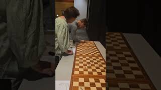 Magnus Carlsen too fast on the boards