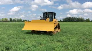 TATE AND BROOKE TAKING THE NEW CATERPILLAR D5 FOR A SPIN