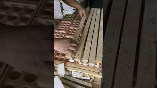 The manufacturing process of the tray inside the beige flocked wine box