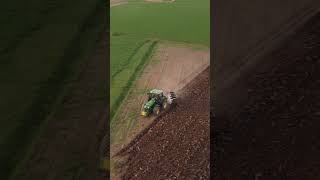 John Deere 8R ploughing