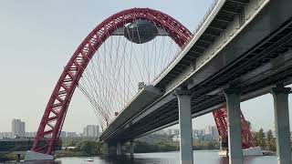 Moscow | river cruise on the Moscow river | a boat approaches a saw-cable bridge called Zhivopisny.