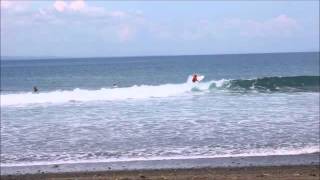 Surfers at Pavones, Costa Rica