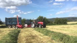 Jason and Chrisy in the MF399 and the New Holland 7840, and the JF900