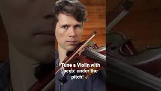 Tuning the violin with pegs