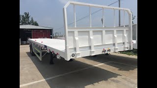 Made in China 40FT 3 Axles Flatbed Trailer Container Semi Trailer FUWA Axle for Sale