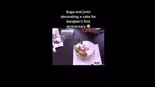 Suga and jimin decorating a cake for bangtan's first anniversary...💜💜💜