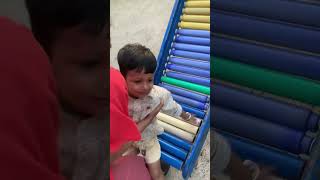 Ishan Playing on Slide