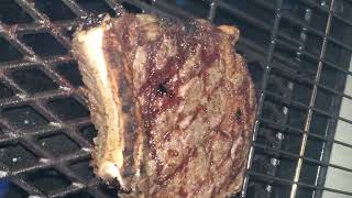 cooking up a huge AAA Canadian beef steak! propane grilling