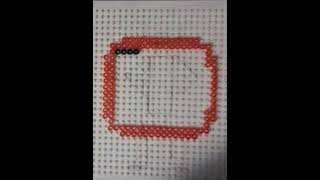 Creating a Miniature Tech Marvel: Bead Art of the Rabbit r1 Device