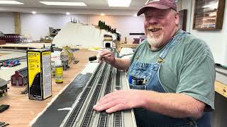 Part two of adding the top coat of asphalt coating on Ed painter HO Railroad in Cohutta Georgia