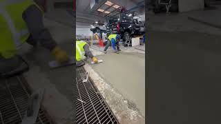 Contractors Finishing up Concrete Work