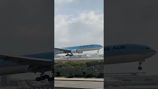 Korean Air Boeing 777-300ER landing at LAX runway 24R